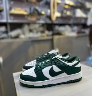 Green and White Nike Dunk Low Retro Sneakers