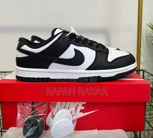 Green and White Nike Dunk Low Retro Sneakers