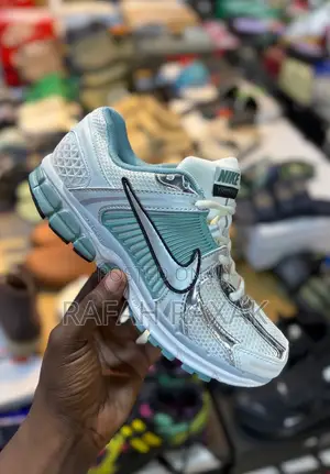Light Blue Nike Zoom Vomero 5 Sneakers