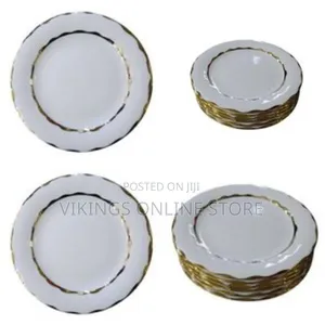 6 Piece Set of Elegant Ceramic Plates With a Gold Rim