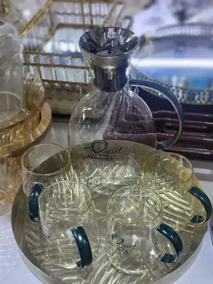 Tea Pot and 4 Glasses