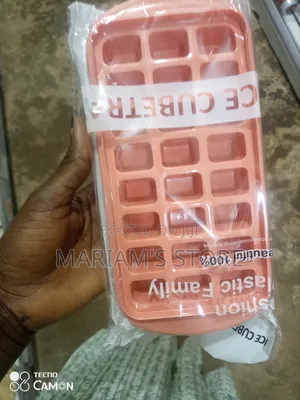 Pink Plastic Ice Cube Tray for a Freezer. [1, 2]