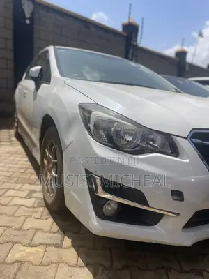 Subaru Impreza 2.0i Sport Premium PZEV 4dr Hatchback AWD (2.0L 4cyl 5M)