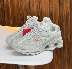 Nike Shox Ride 2 Sp Supreme in the Light Bone and Turf Orange