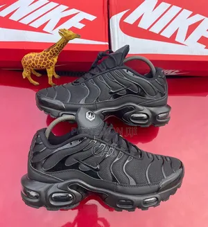 Nike Air Max Plus Tn Triple Black Sneakers.