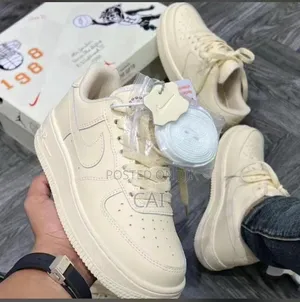 Force 1 Low Sneakers in a "Coconut Milk" Beige