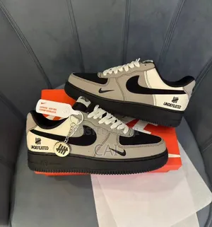 Nike Air Force 1 Undefeated "5 on It" Sneakers.