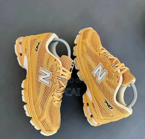 New Balance 740 Sneakers in a Golden Brown