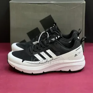 Black and White Adidas More Than Speed Men's Running Sneakers.