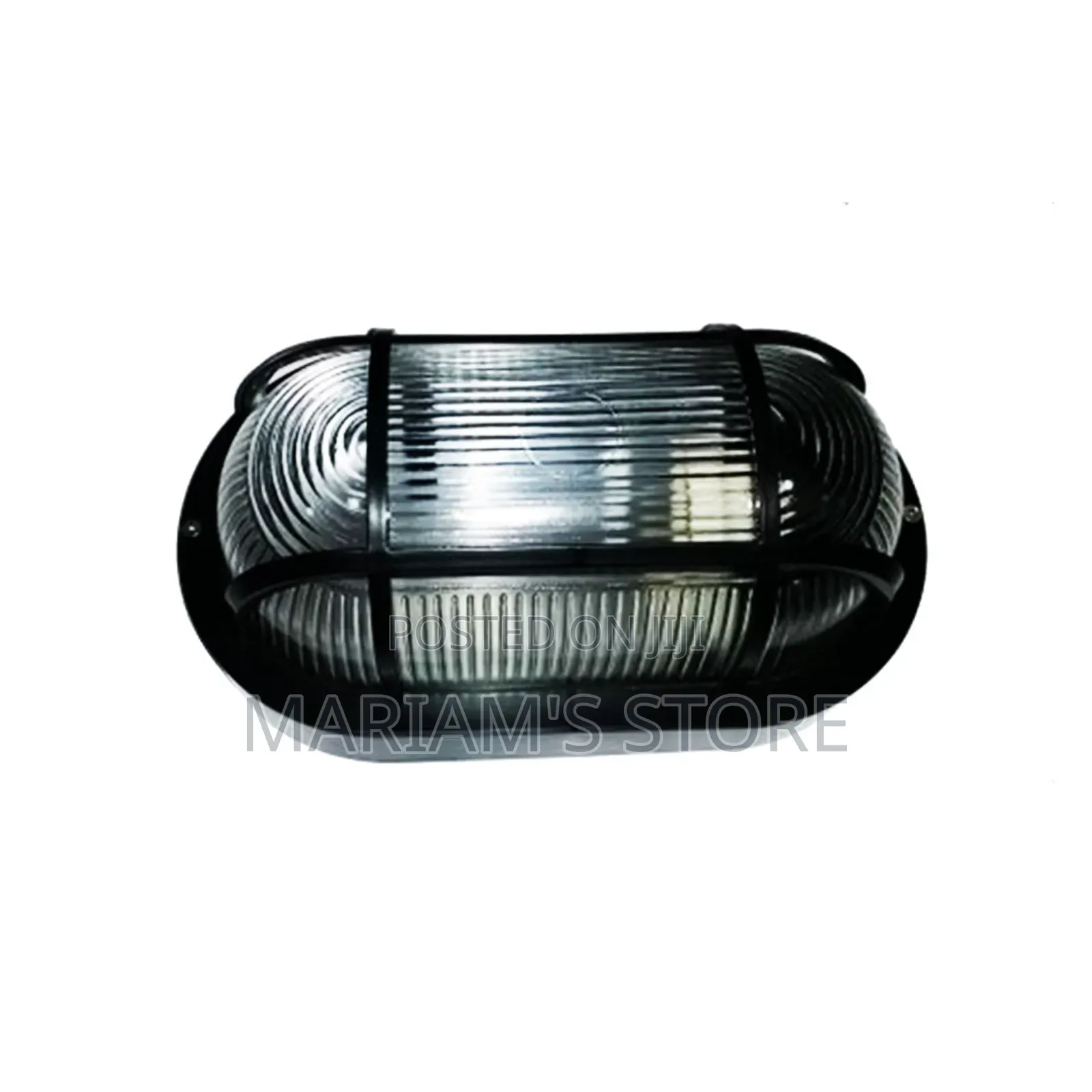 Bulkhead Wall Light a Protective Black Grid Over a Ribbed Glass Cove]