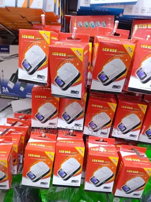 LCD Usb Charger to Charge Removable Mobile Phone Batteries Directly.