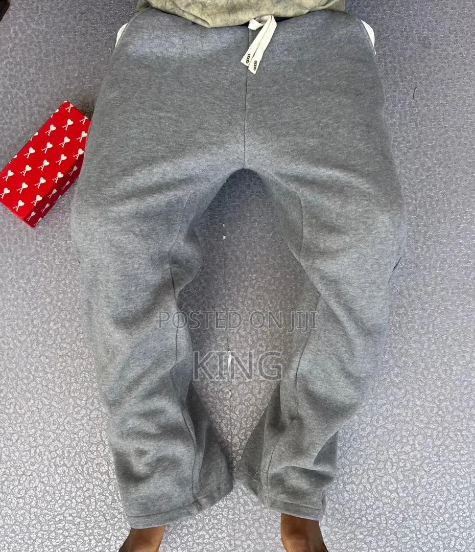 Unisex Open-Hem Buggy Sweaterpants in Grey and Black.