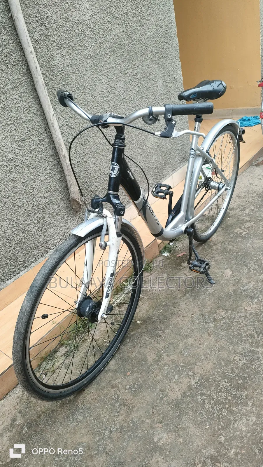 Germany Used Silver Downtube City Bicycle Features an Aluminum Frame.