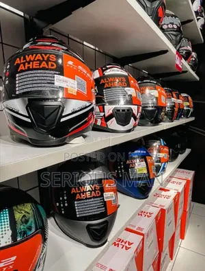 Ls2 Motorcycle Helmets Organized Neatly On Shelving Units