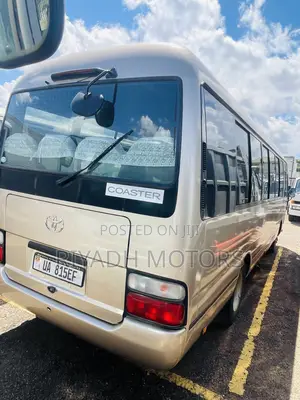 Toyota Coaster 2012 Brown
