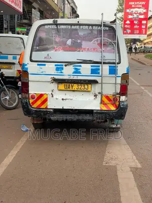 Behind Glass Taxi Advertisement