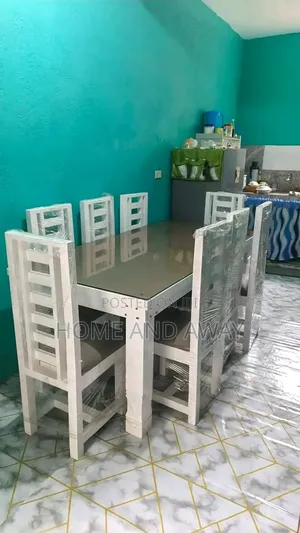 6 Seaters Glassed Wooden Dining Table Sets in Any Colour 2,000,000/-