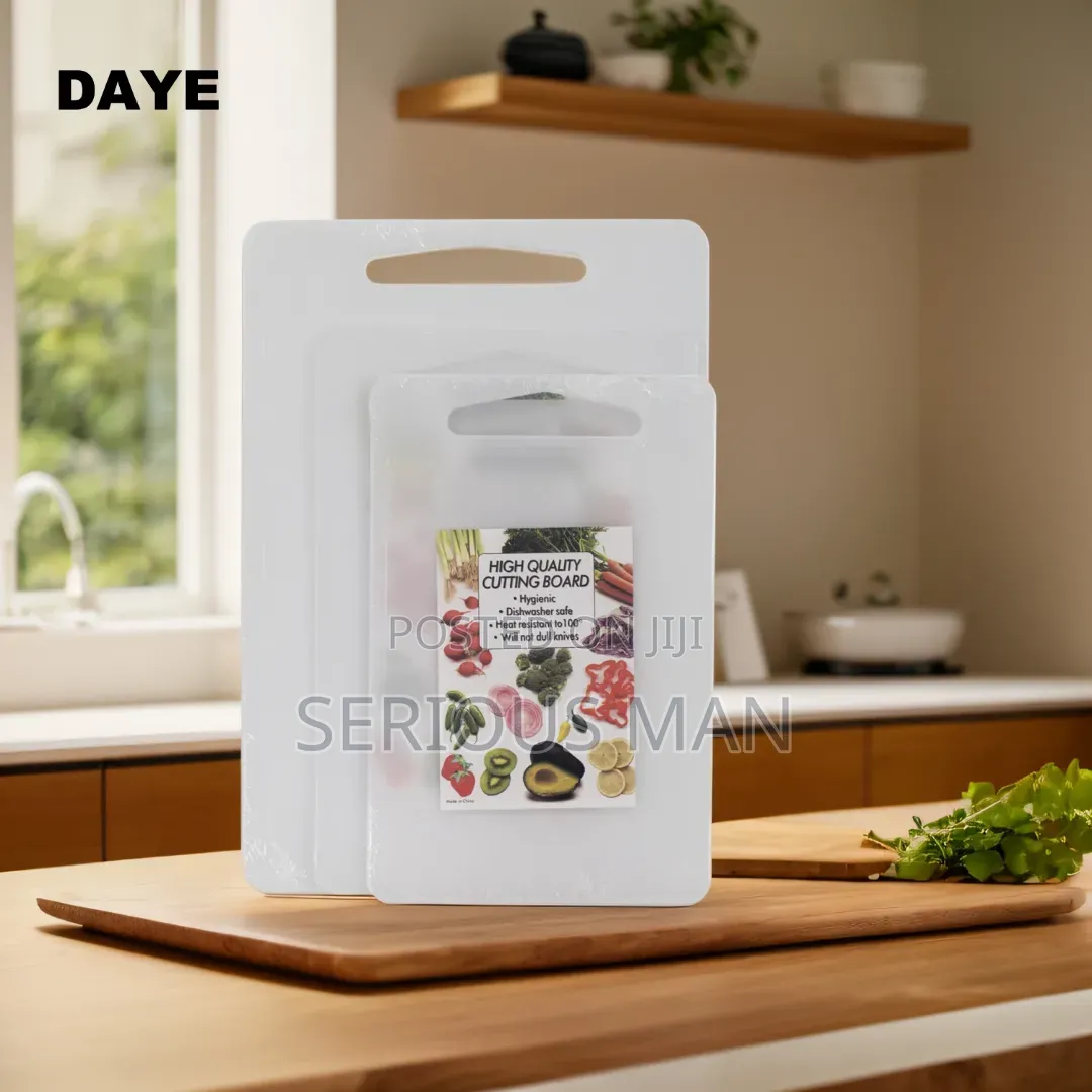 Rectangular Plastic Cutting Board Wrapped in Clear Plastic Film