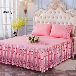 Pink Lace Ruffle Bedliner With a Delicate Embroidered Floral Pttern]