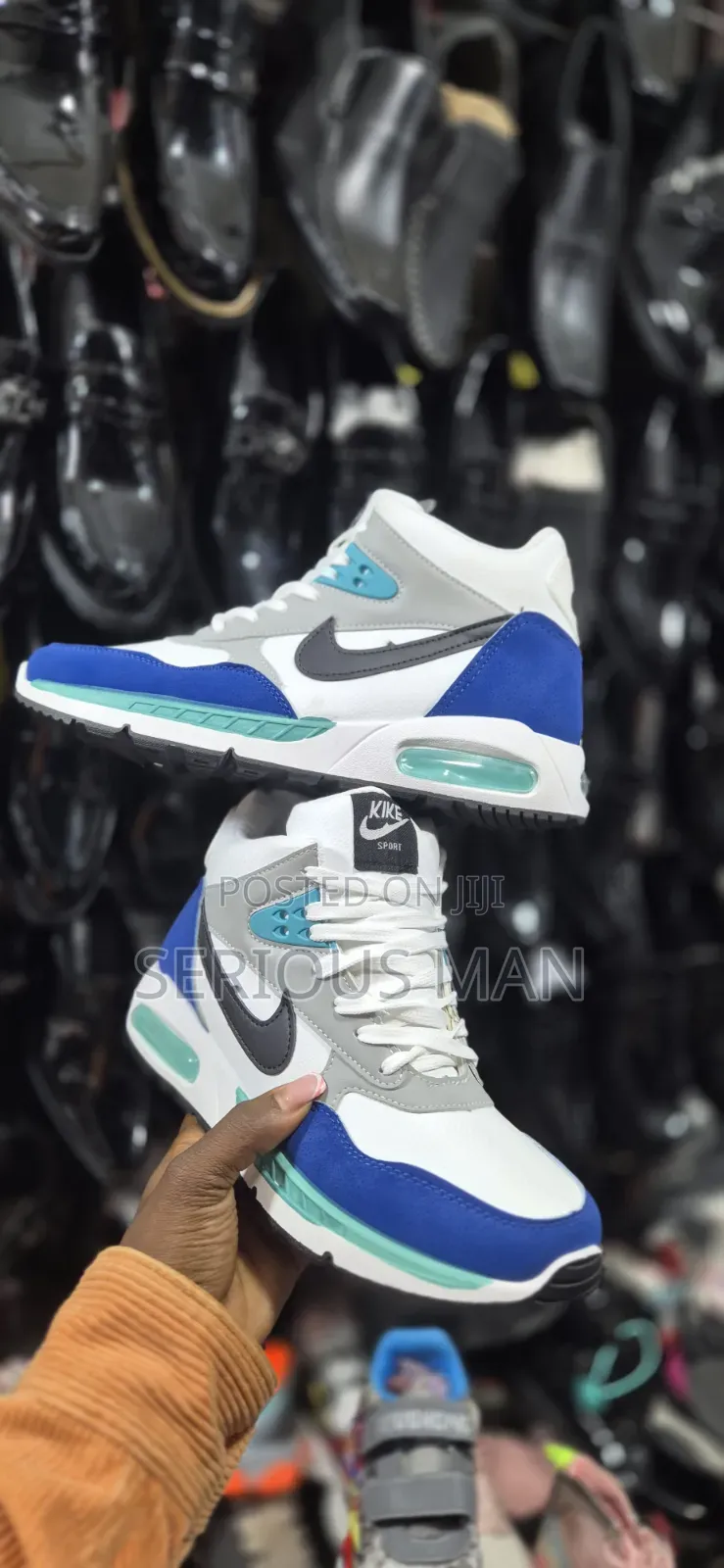 Counterfeit Mid-Top Sneaker Branded as "Kike Sport