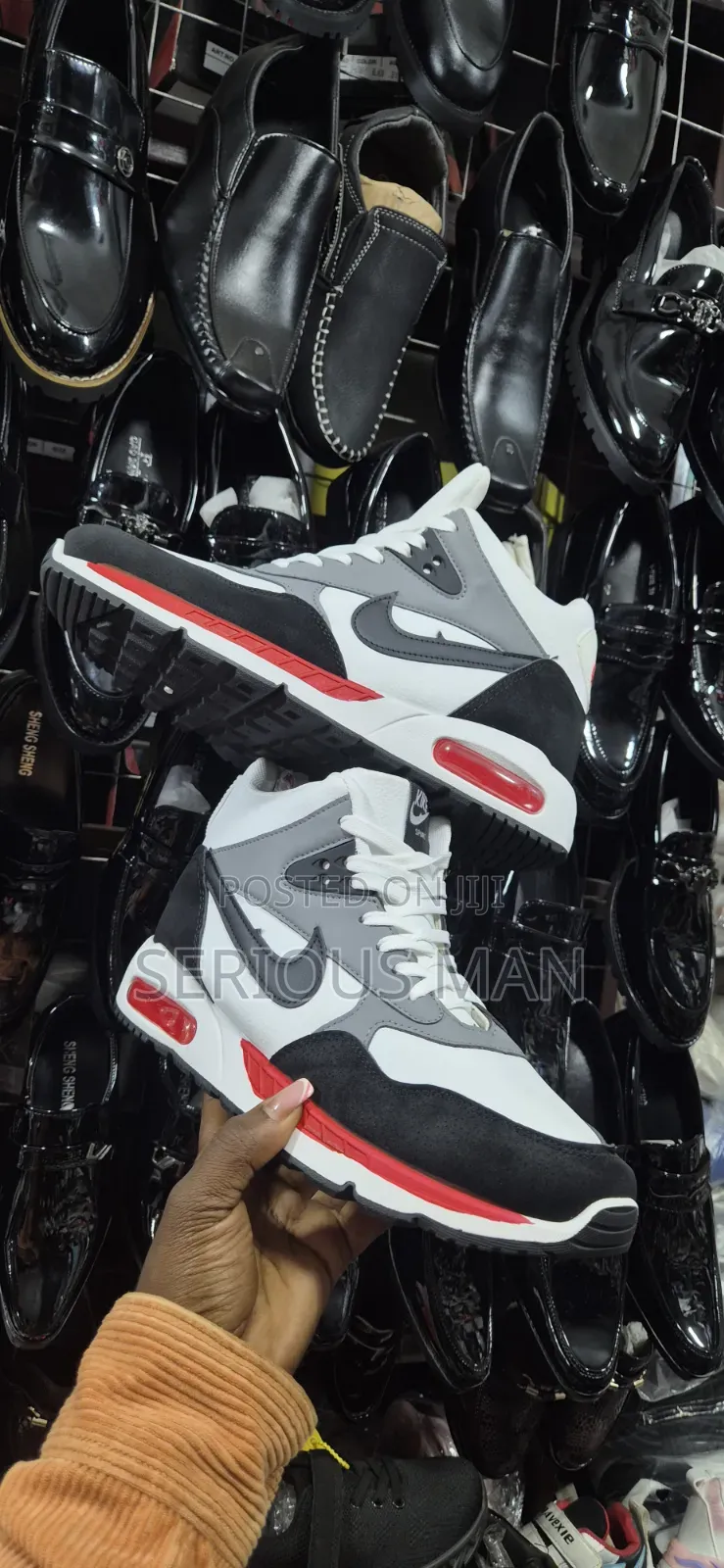 Counterfeit Mid-Top Sneaker Branded as "Kike Sport