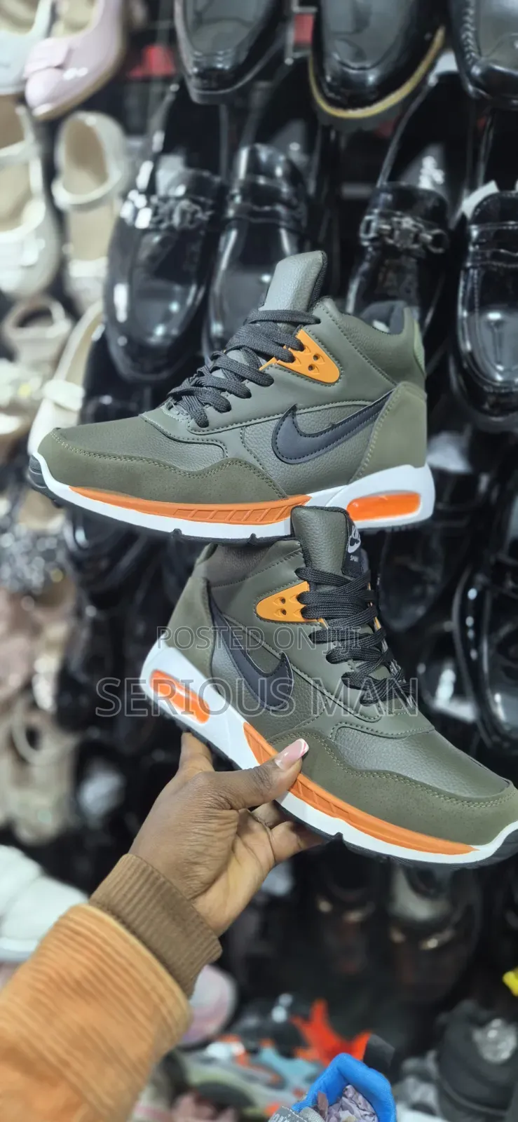 Counterfeit Mid-Top Sneaker Branded as "Kike Sport