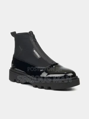 Black Ankle Boots Showcase a Bold,