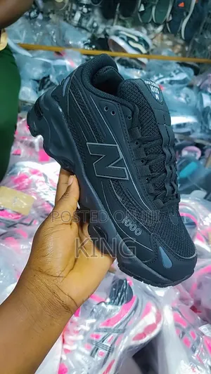 New Balance 1000 Sneakers. Black, Pink, Grey.