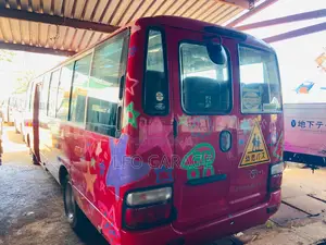 Toyota Coaster 2013 Red