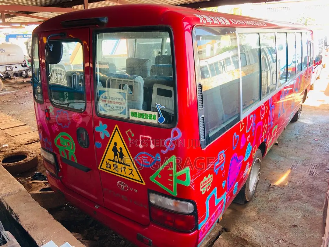 Toyota Coaster 2013 Red