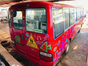 Toyota Coaster 2013 Red