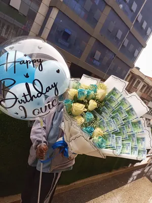 Flower Bouquet With Money in and a Balloon