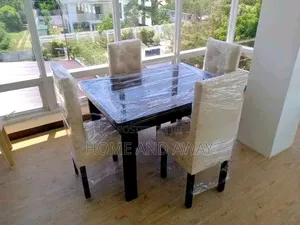 Glassed 4 Seaters Dining Sets in Any Colour or Shape From 1,580,000/-
