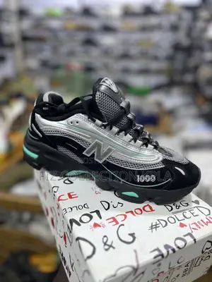 New Balance 1000 Black/Teal (Or Black Aqua Blue) Colorway.