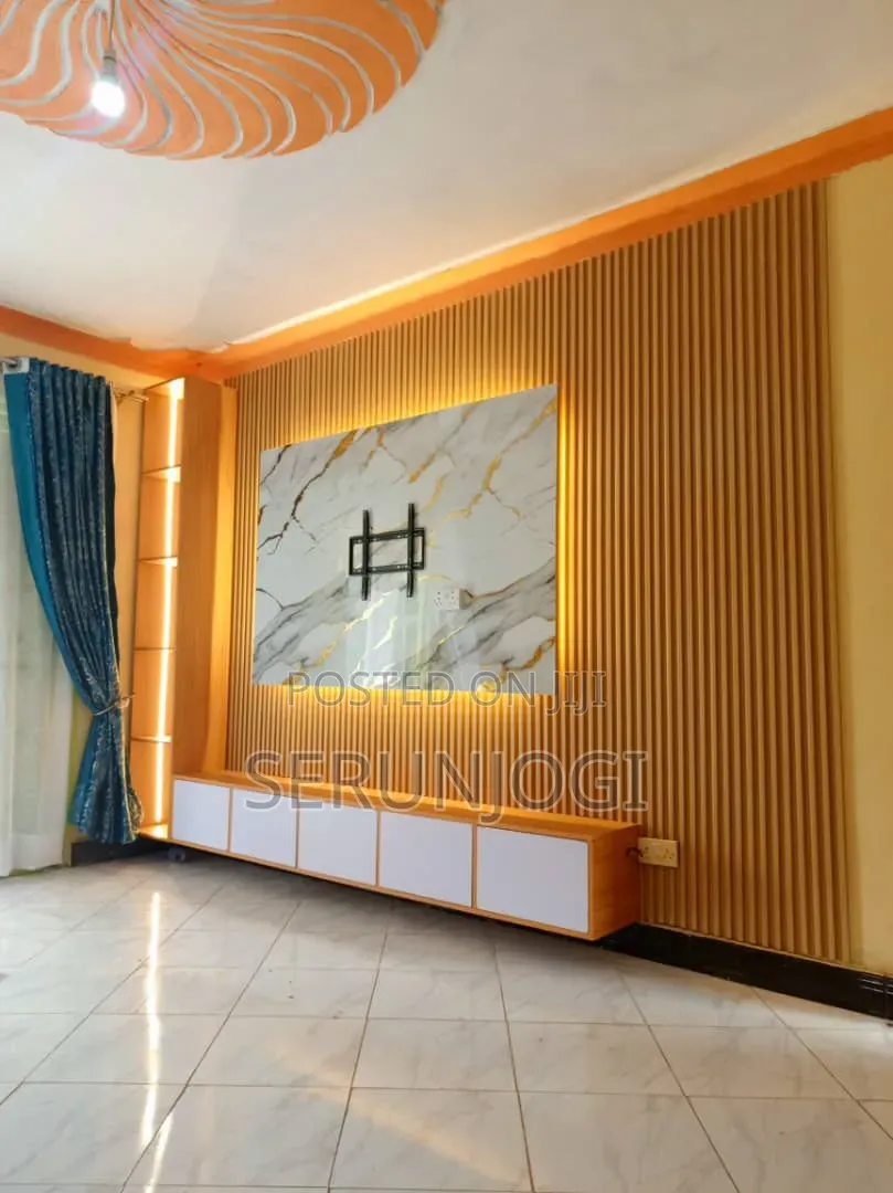 Tv Unit and Paintings