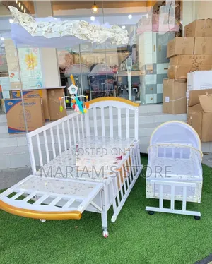 White Wooden Baby Cot Set Features a Convertible Design ]