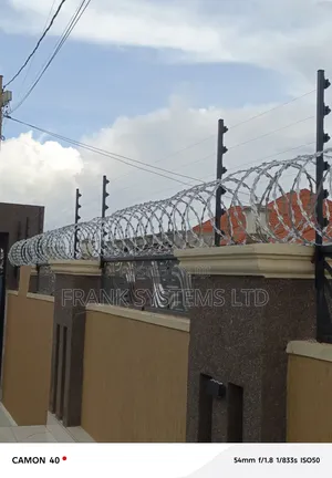 Electric Fence Installation With Surveillance Cameras