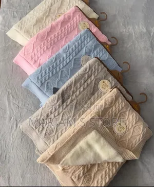 Canarie Brand Baby Blankets Feature a Cable Knit Pattern in Multicolor