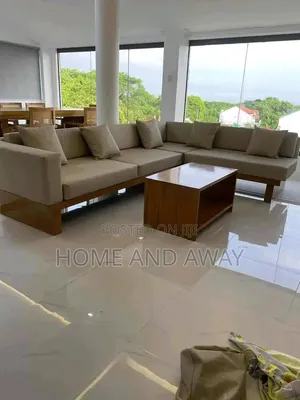 7 Seaters Wooden L Shape Sofa Chairs With Center Table 2,800,000/-