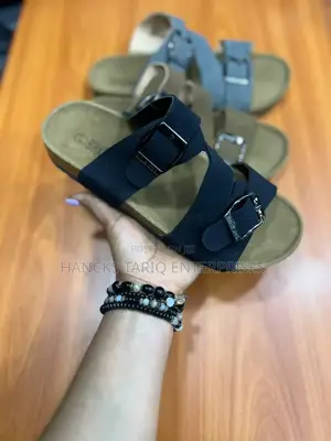 Pair of Grey Dual-Strap Sandals