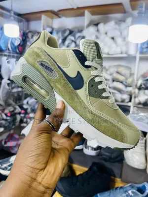 The Nike Air Max 90 Sneakers in a Neutral Olive Olive Colorway,