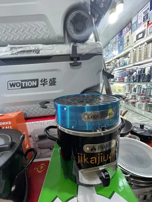 Portable "Jijuao" Brand Charcoal Stove With an Integrated Grill Top.