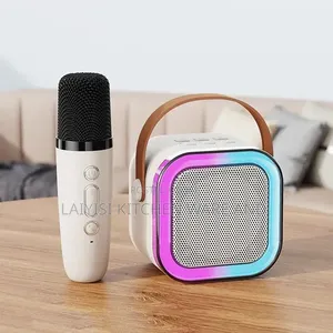 Kids Portable Karaoke Machine a Wireless Speaker and a Microphone.