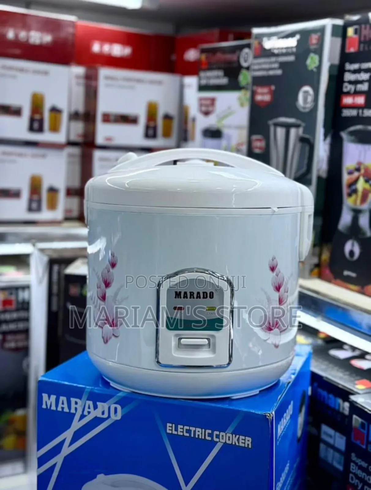 Marado White Electric Rice Cooker With a Floral Pattern .