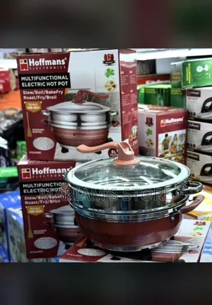 Multifunctional Electric Hot Pot With a Non-Stick Cooking Surface .