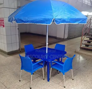 Chairs and and Table With Umbrella