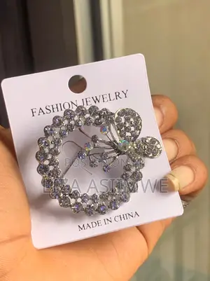 Silver-Toned Alloy Brooch Featuring a Delicate Butterfly