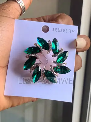 Garland Brooch Features Marquise-Cut Green Crystals