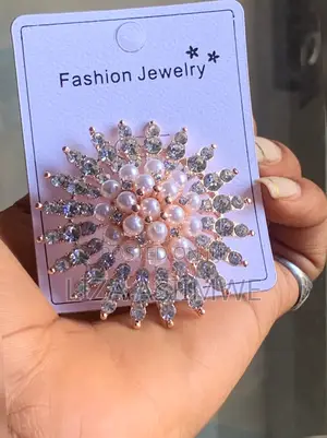 Rofarso Brooch Accented With Sparkling Crystals and Imitation Pearls.