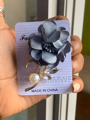 Grey Fabric Rose Brooch Features a Prominent Faux Pearl and Crystal